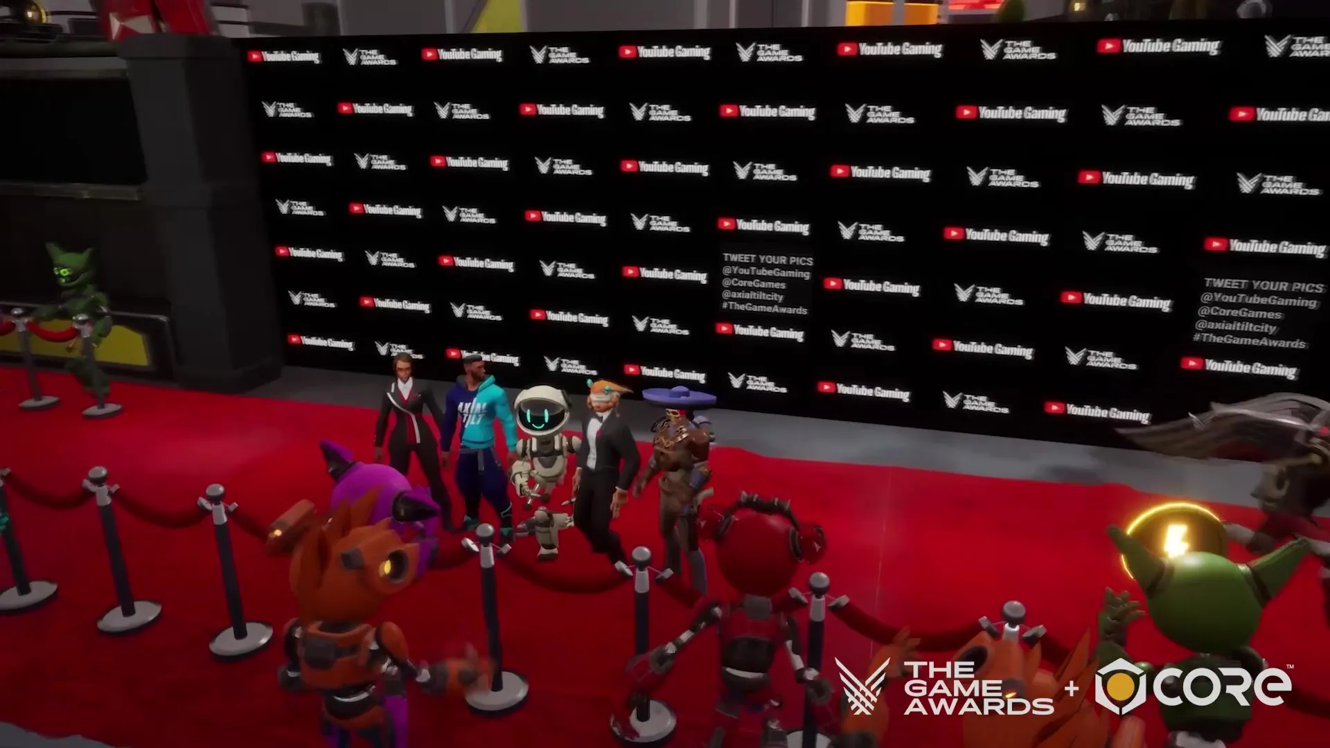 The Game Awards x Core red-carpet event: a step-and-repeat wall with YouTube Gaming and The Game Awards logos, attendee avatars on the red carpet, and Axial Tilt City signage.